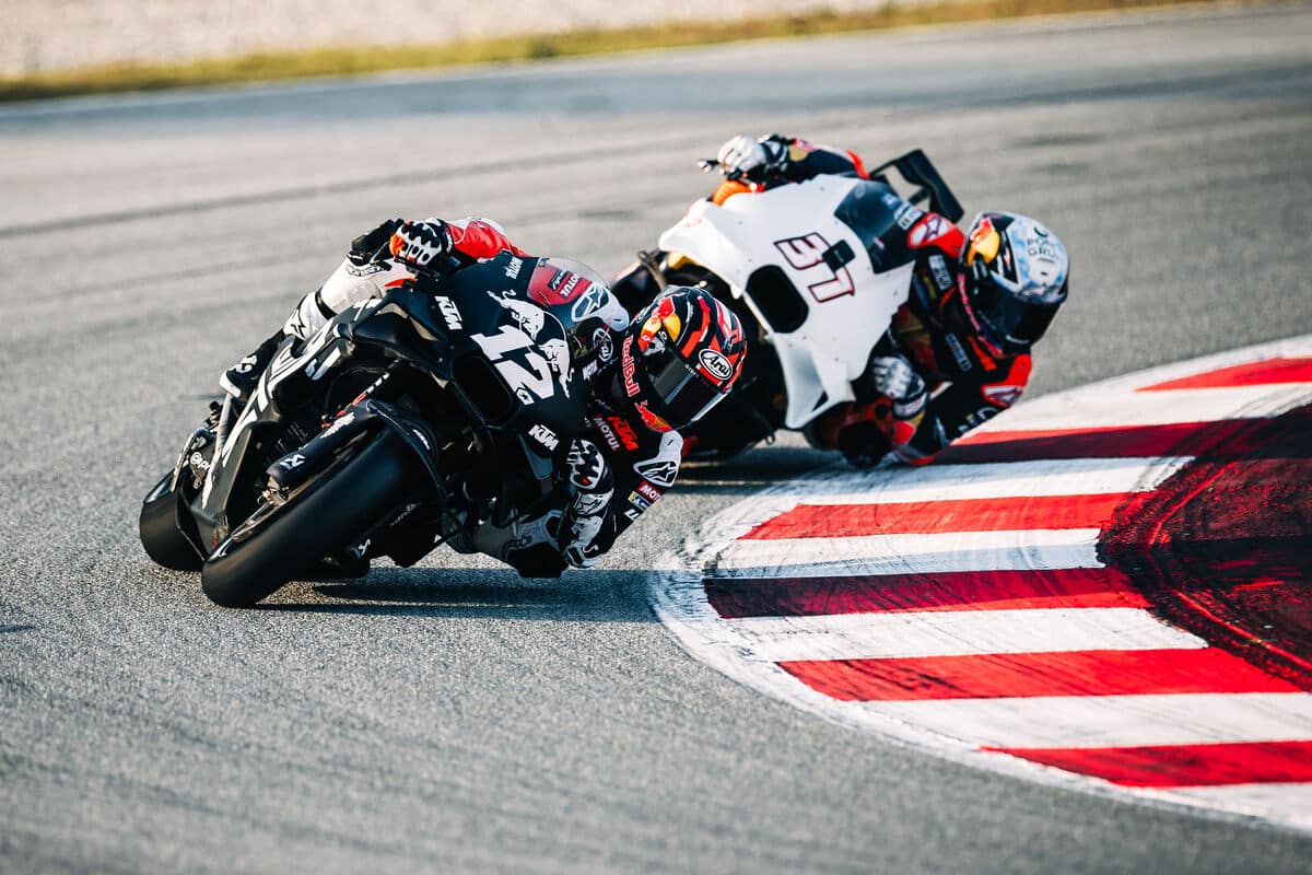 Road racing motorcycles mid-corner on track