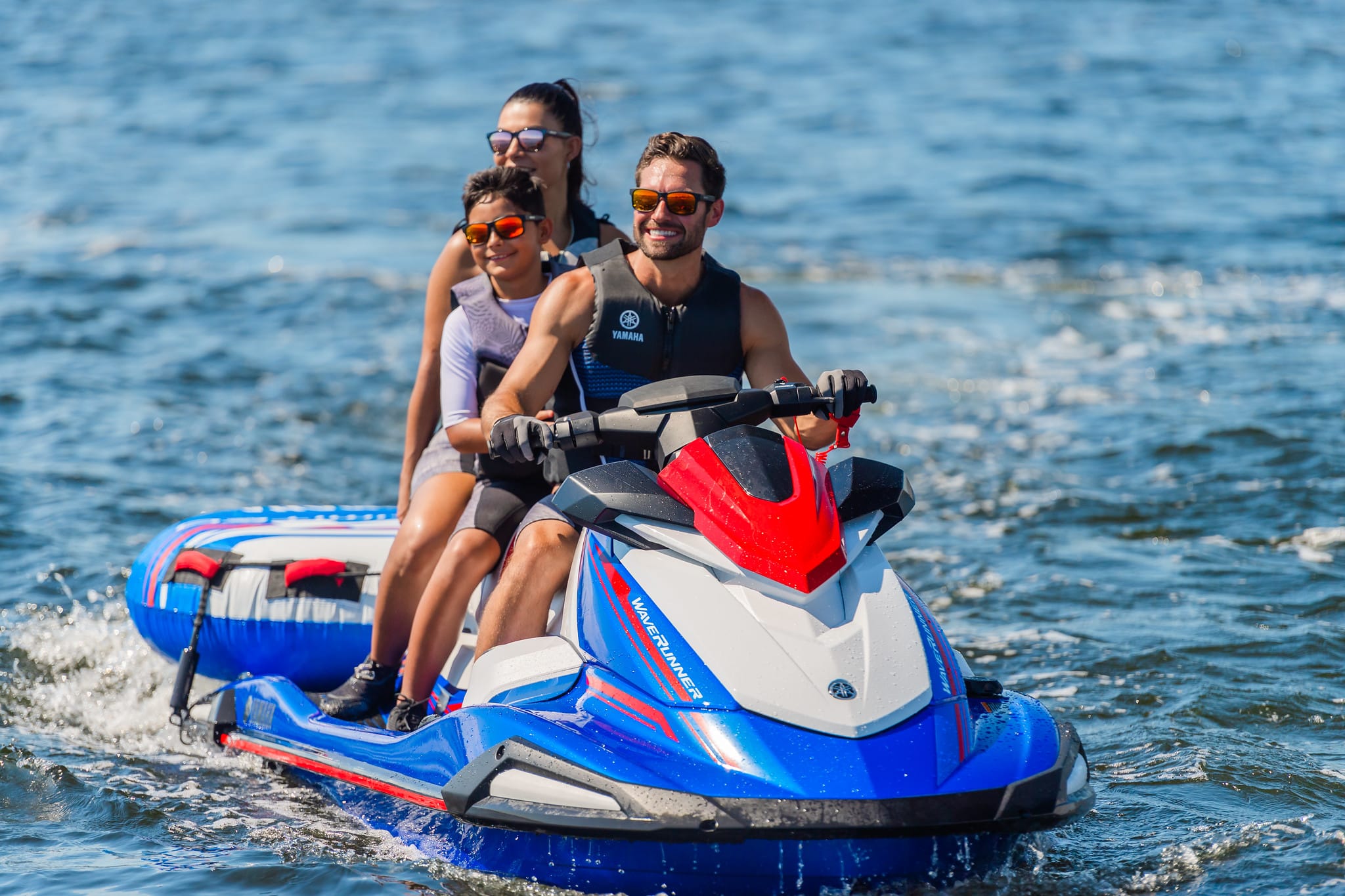 Family riding a WaveRunner